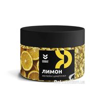 Банка желейных кусочков Cookit Лимон с чёрной крышкой, светло-жёлтые кубики видны через стенку