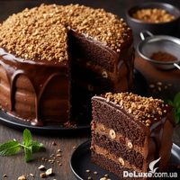 Шоколадный торт, посыпанный дроблёным фундуком в карамели, фото поставщика