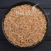 Рис бурий довгий